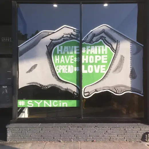 Hands mural with faith, hope and love