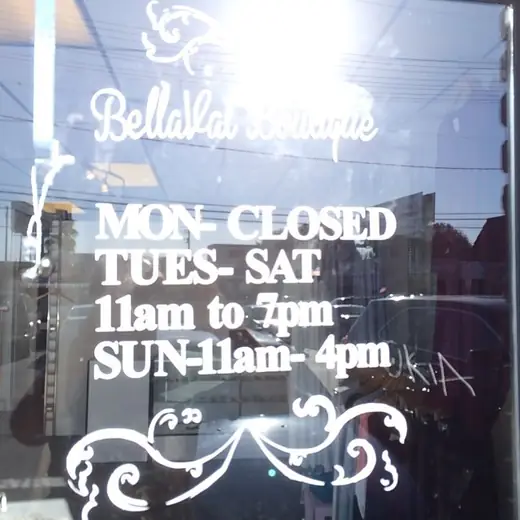 Vinyl store hours lettering