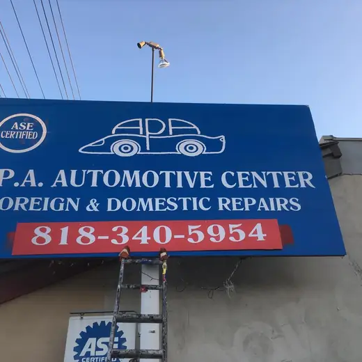 Auto center cabinet sign